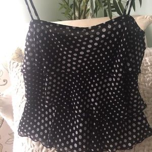 100% silk.Dress it up with a blazer/ pair of jeans